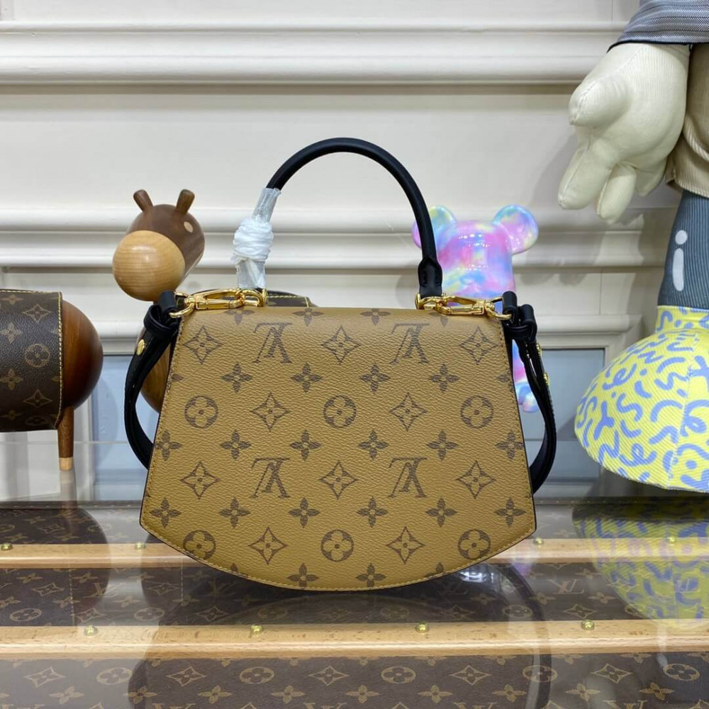 Louis Vuitton Monogram Reverse Canvas Tilsitt M46548