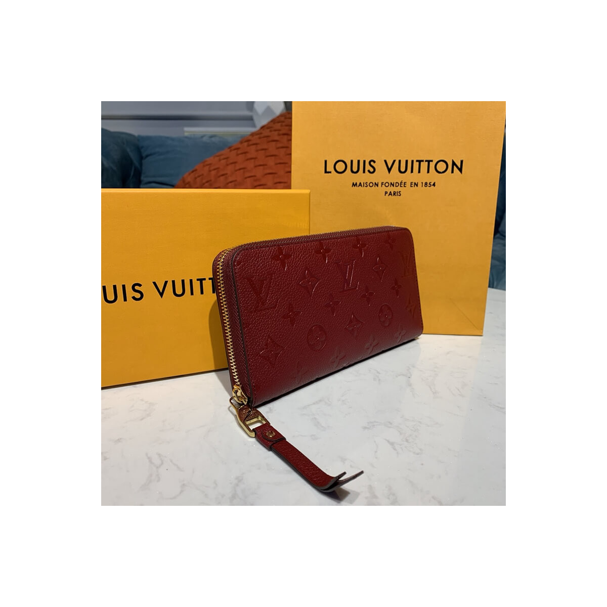 Louis Vuitton Monogram Empreinte Leather Zippy Wallet M61864