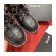 Chanel Black Quilted Gold CC Logo Chain Combat Lace Up Boots G36424