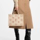 Louis Vuitton Monogram Empreinte Leather OnTheGo MM M21575 Creme/Pink