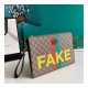 Gucci &#039;Fake/Not&#039; Print Print Pouch 636171