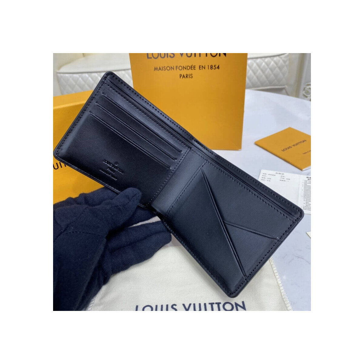 Louis Vuitton Grained Calf Leather Multiple Wallet M69829