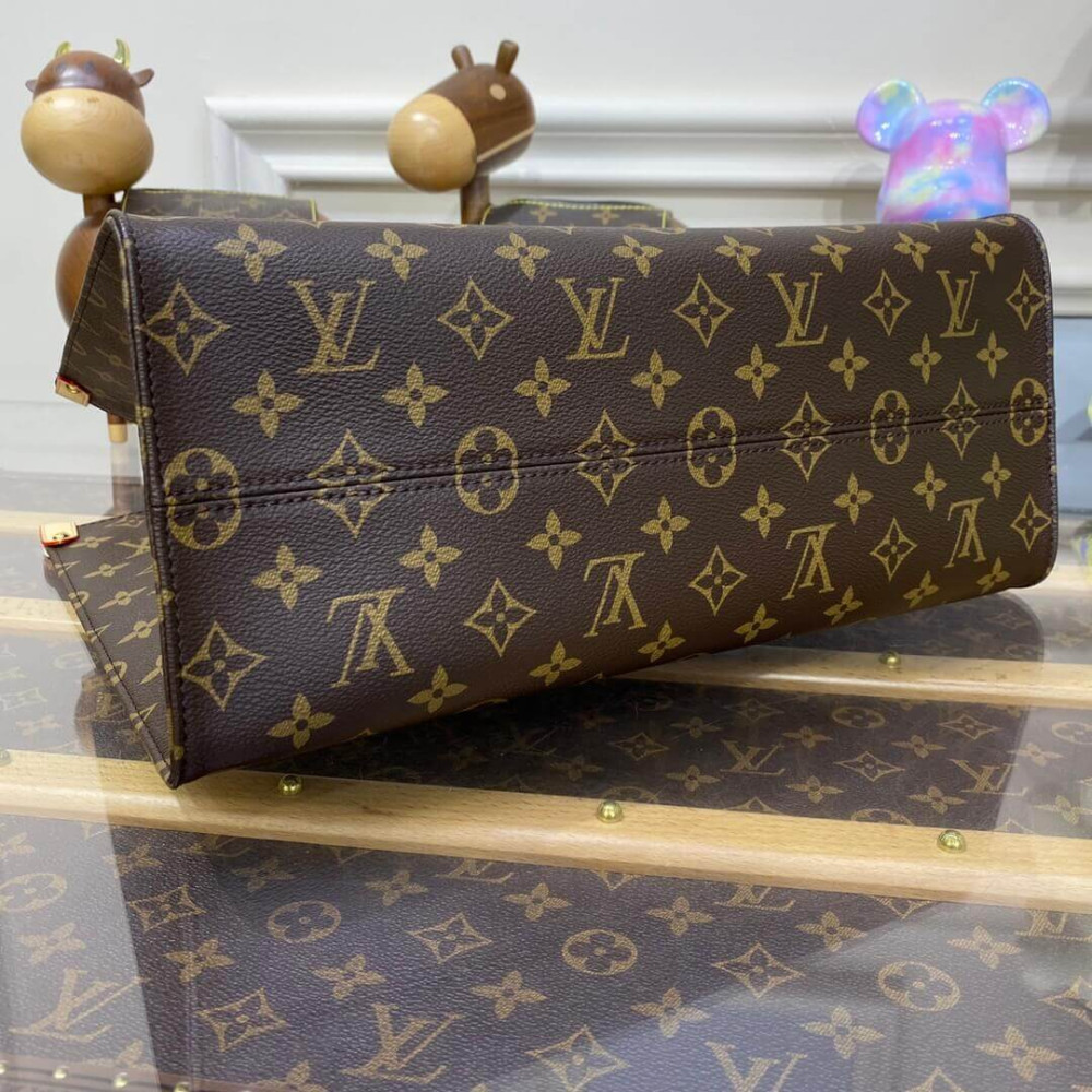 LV x YK OnTheGo MM with Faces Print and Embroidery M46429