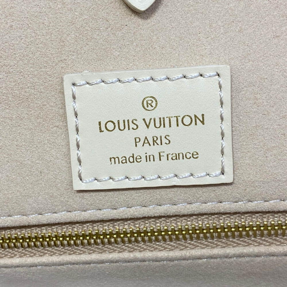 Louis Vuitton Monogram Empreinte Leather OnTheGo MM M21575 Creme/Pink