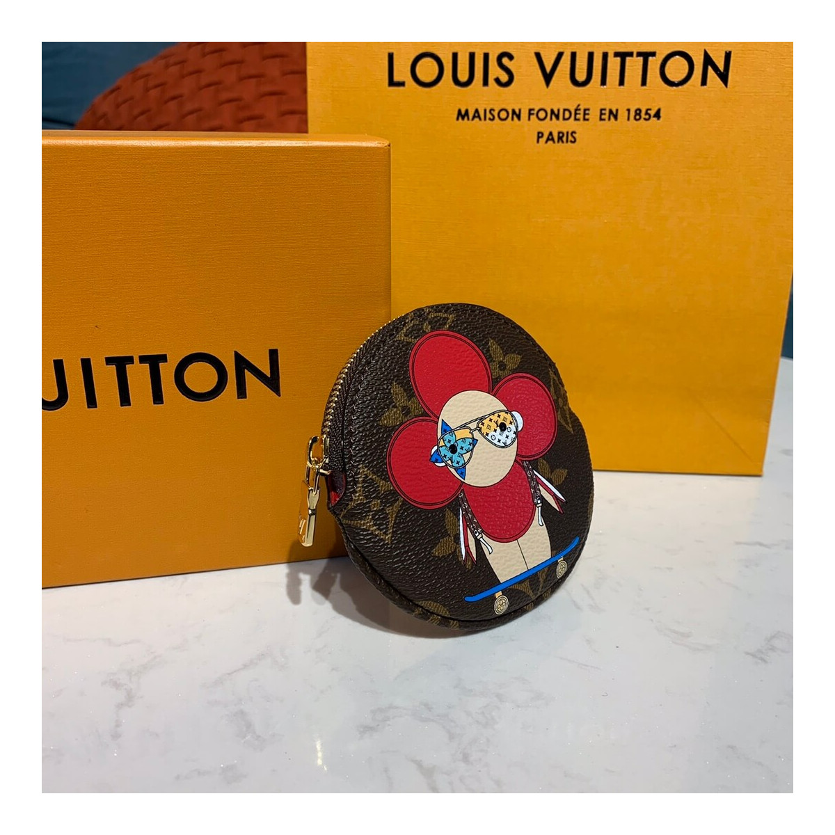 Louis Vuitton Vivienne Holiday Round Coin Purse M69057