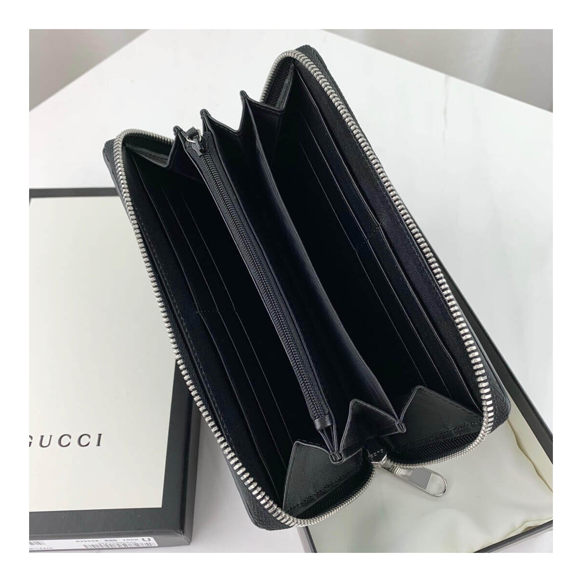 Gucci GG Embossed Zip Around Wallet 625558