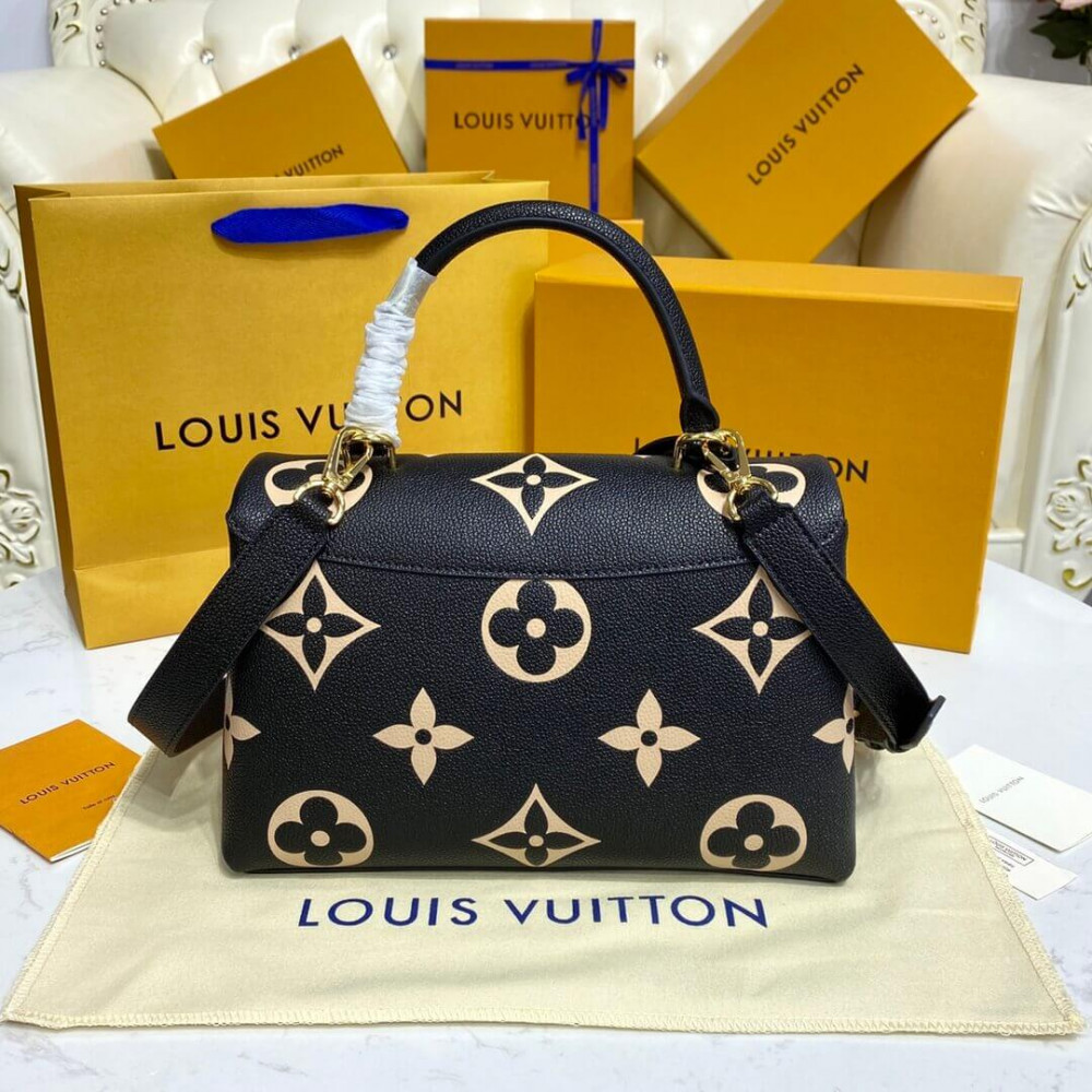 Louis Vuitton Bicolor Monogram Empreinte Leather Madeleine MM M46041