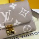 Louis Vuitton Bicolor Monogram Empreinte Leather Madeleine BB M45978