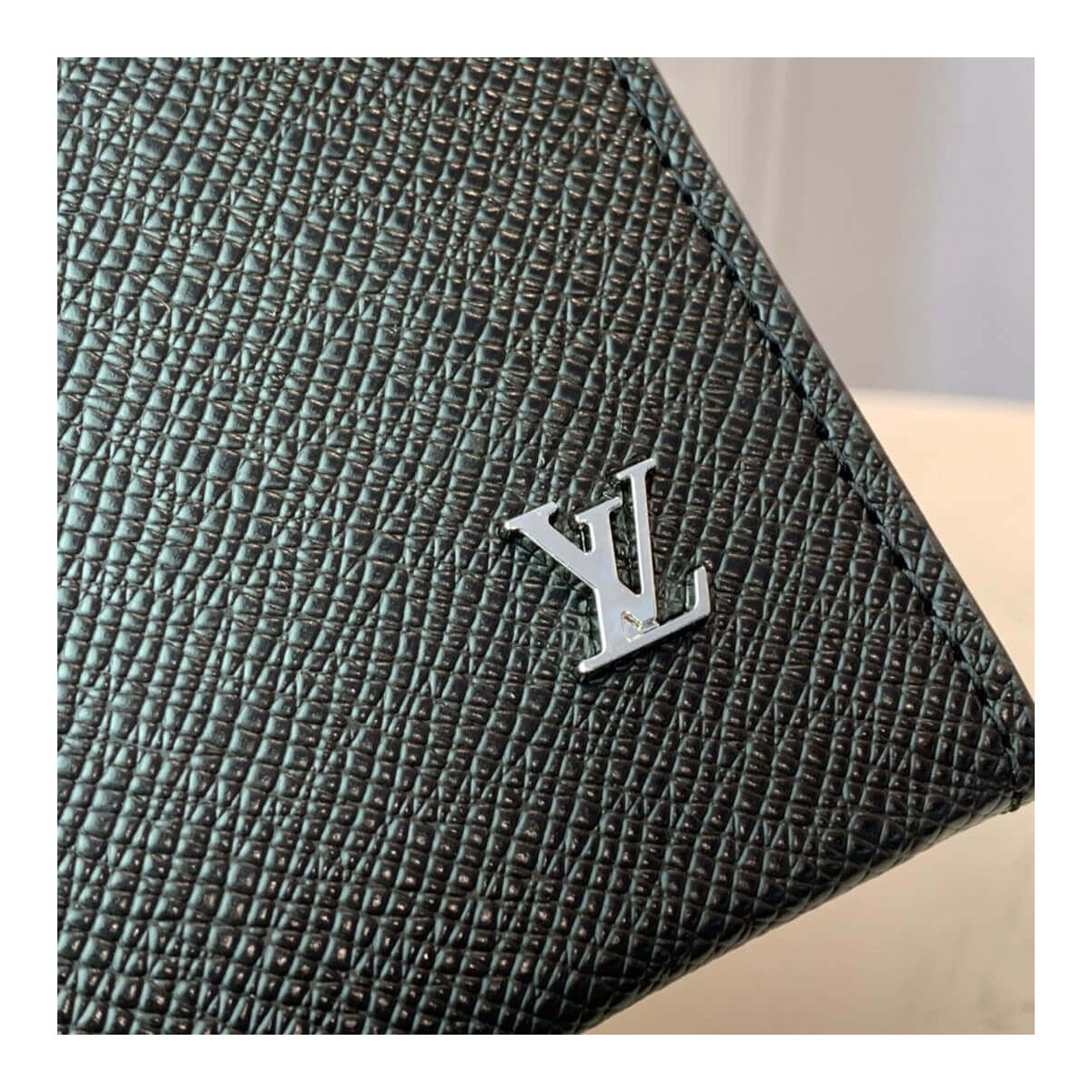 Louis Vuitton Taiga Leather Pochette Voyage M30450