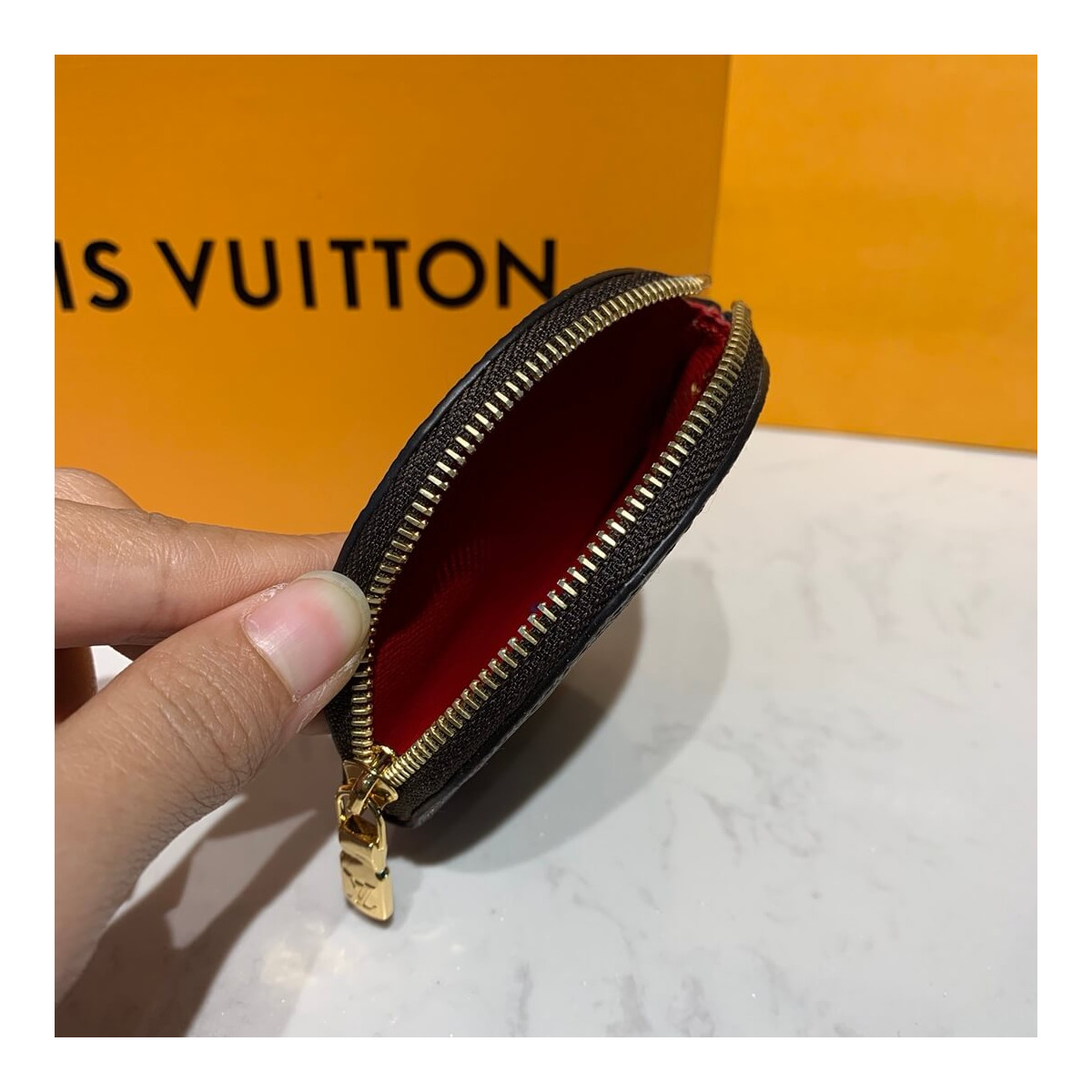 Louis Vuitton Vivienne Holiday Round Coin Purse M69057