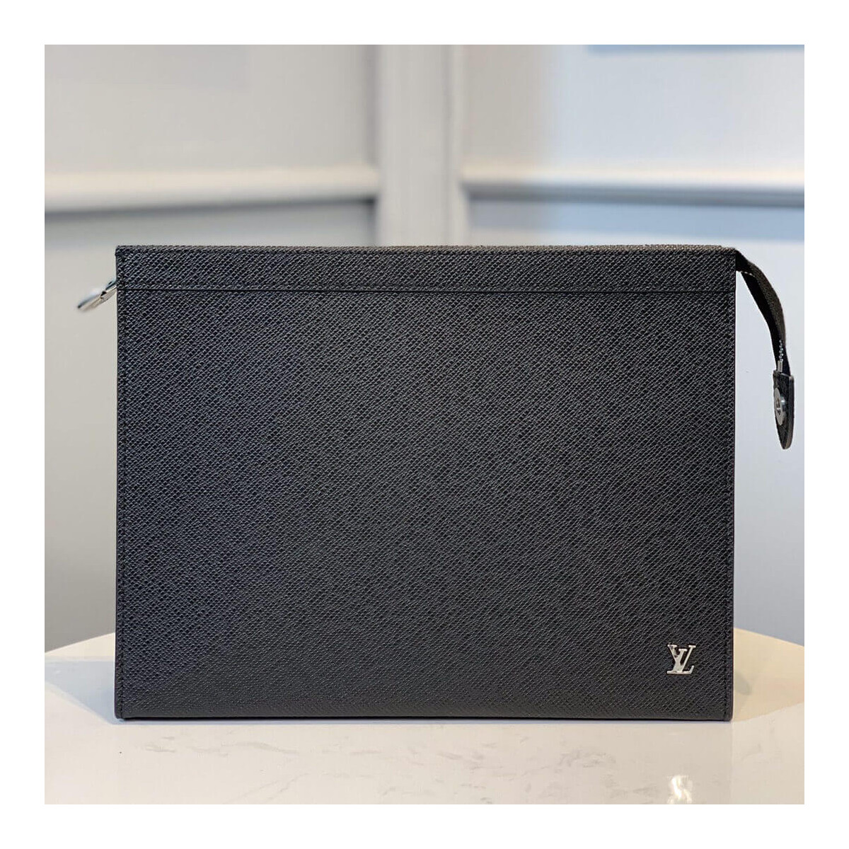 Louis Vuitton Taiga Leather Pochette Voyage M30450