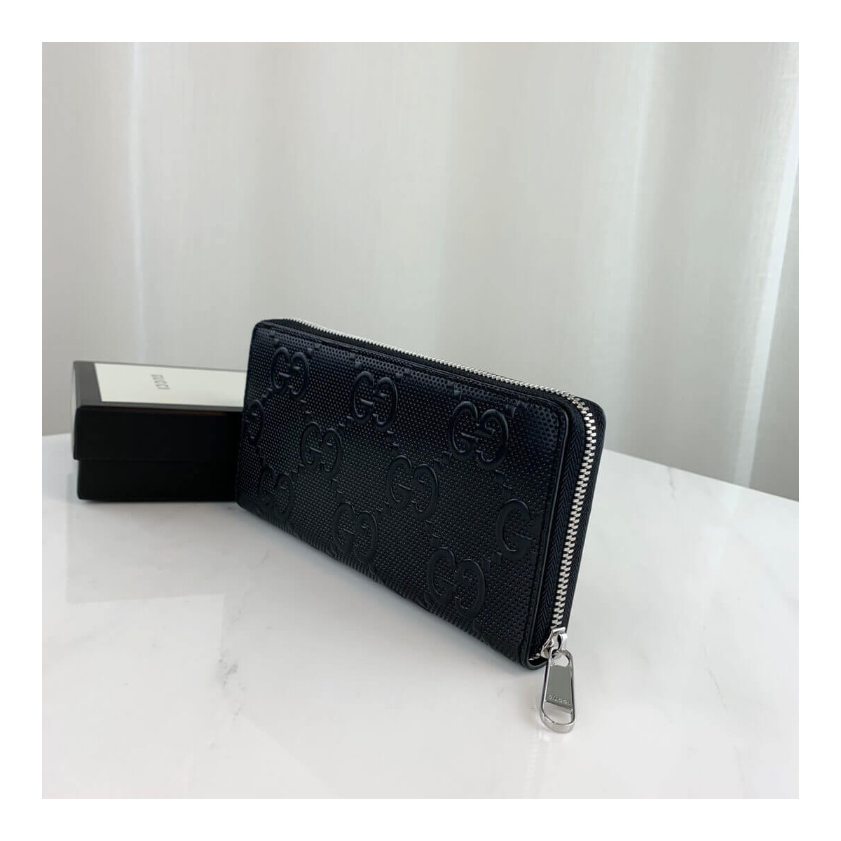 Gucci GG Embossed Zip Around Wallet 625558