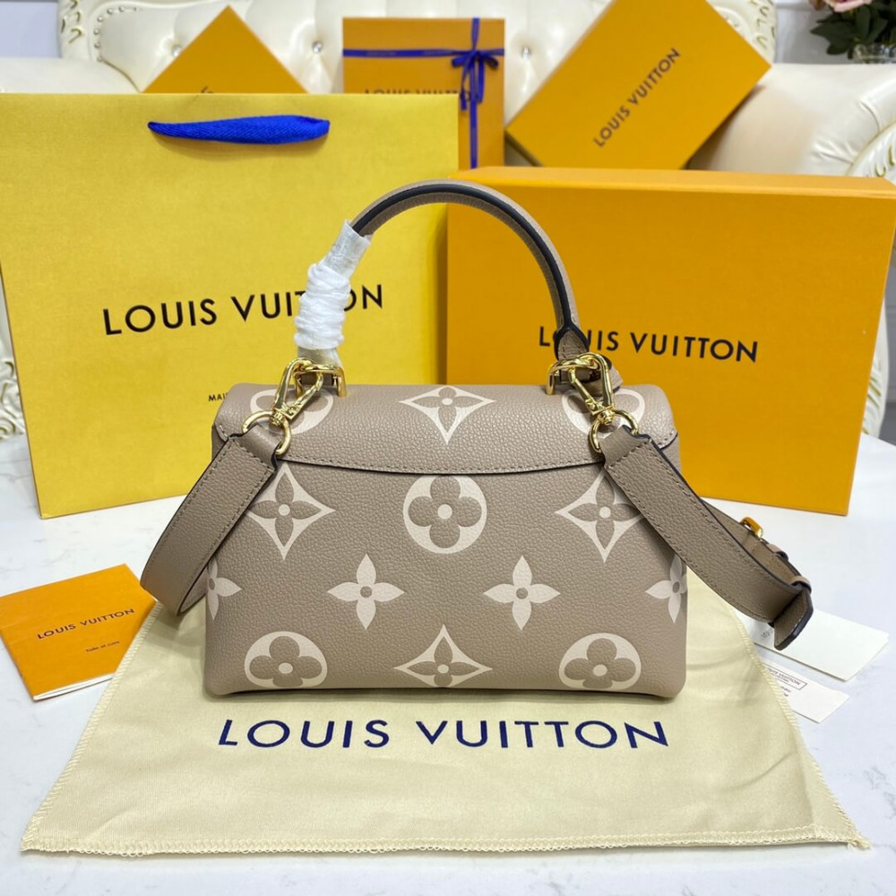 Louis Vuitton Bicolor Monogram Empreinte Leather Madeleine BB M45978