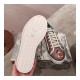 Gucci  Disney x Gucci Tennis 1977 Sneaker with Web 606110