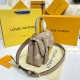 Louis Vuitton Bicolor Monogram Empreinte Leather Madeleine BB M45978