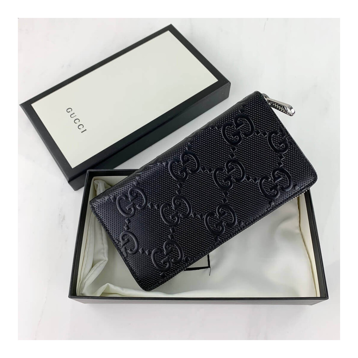 Gucci GG Embossed Zip Around Wallet 625558