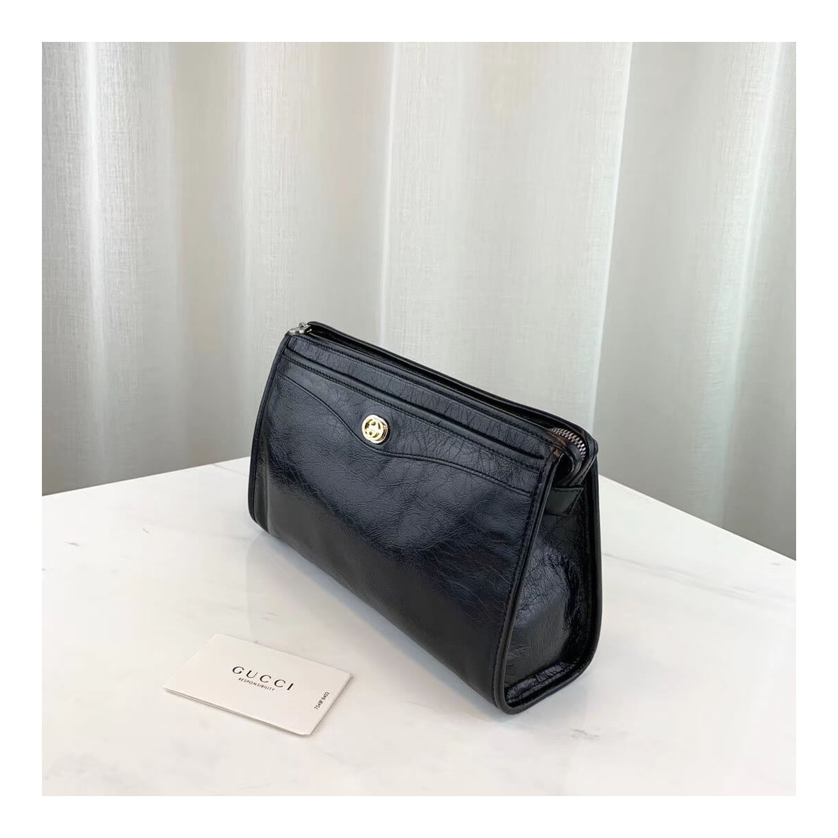 Gucci Pouch with Interlocking G 575991