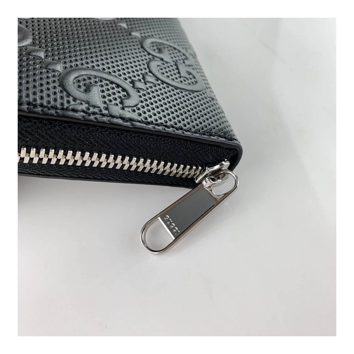 Gucci GG Embossed Zip Around Wallet 625558