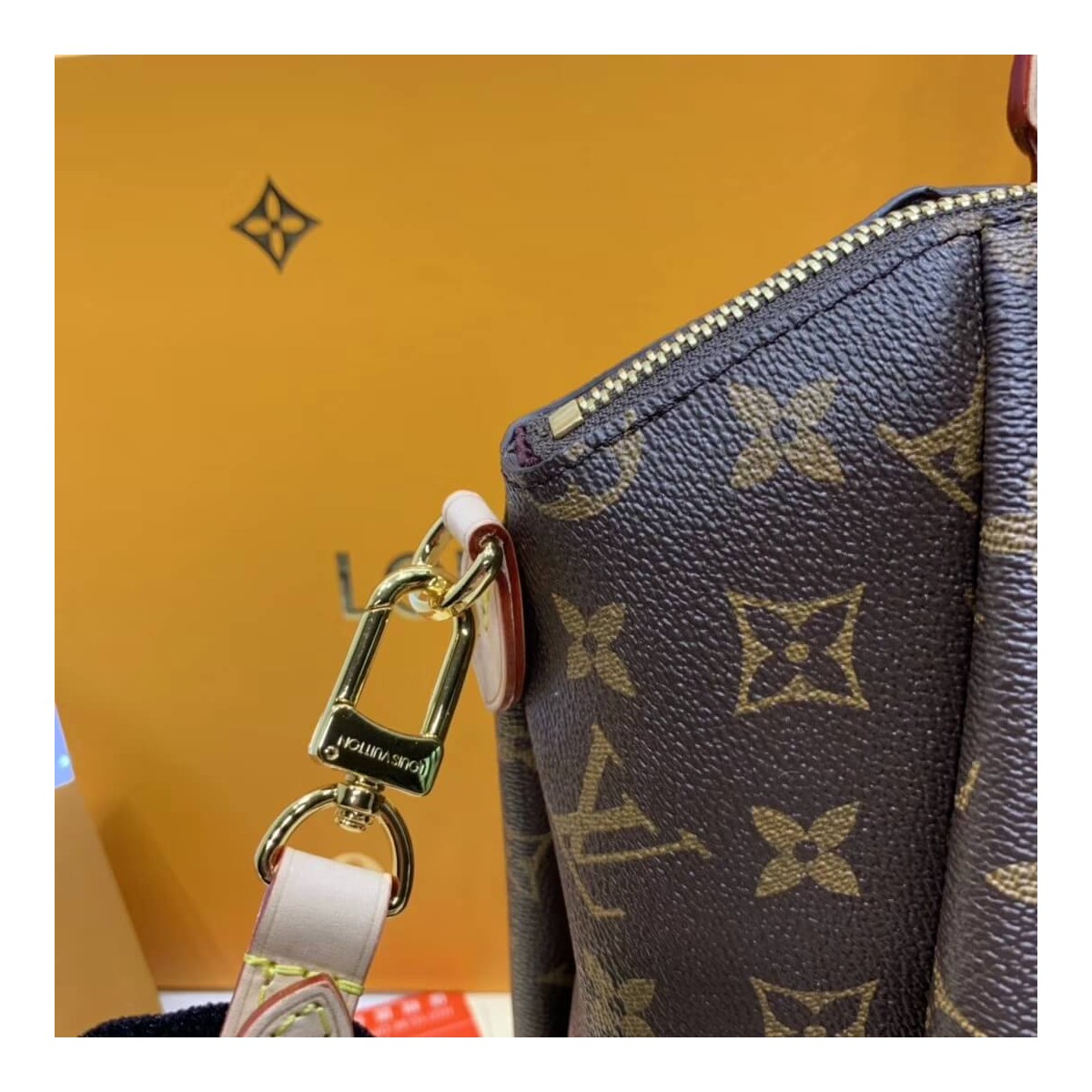 Louis Vuitton Monogram Canvas Rivoli MM M44546