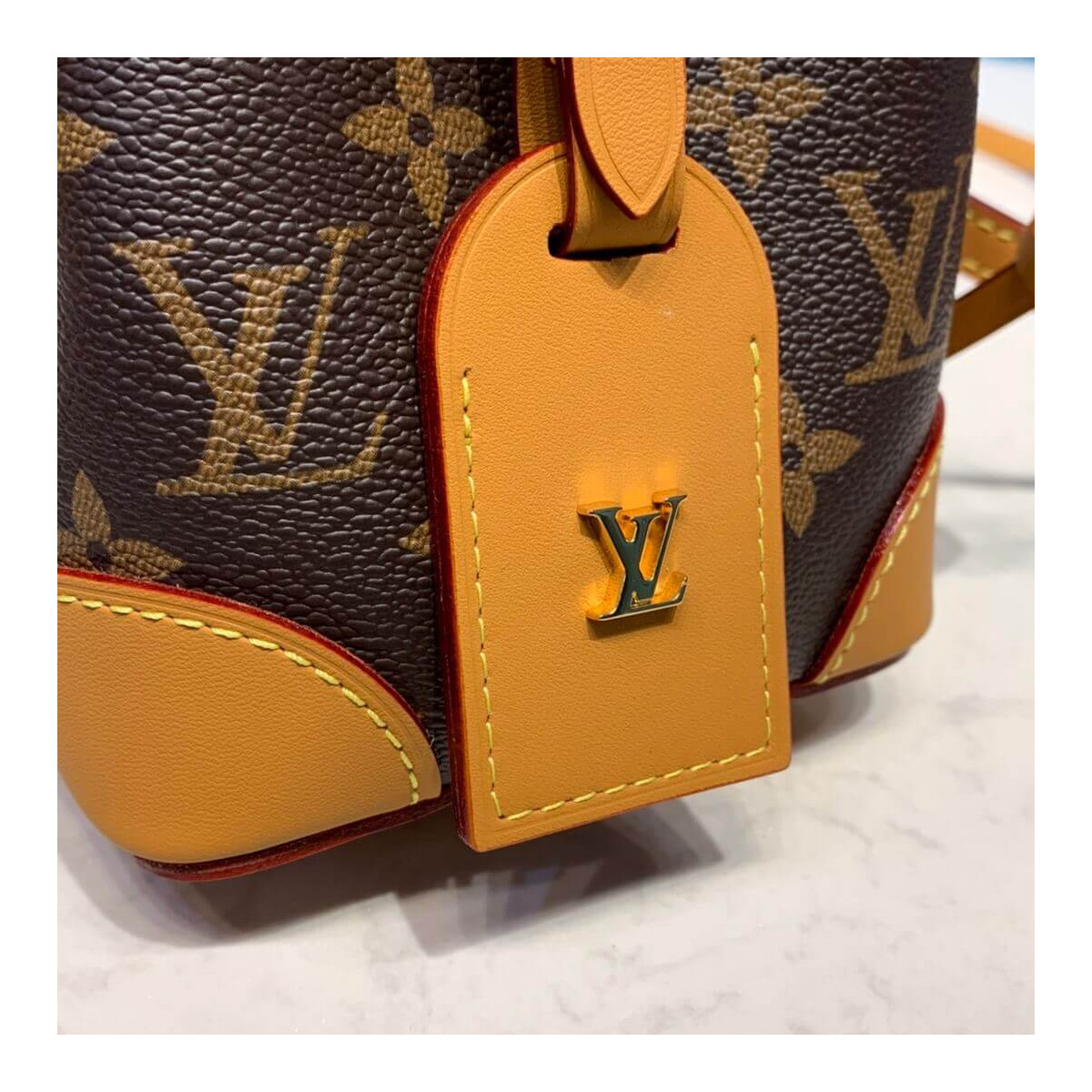 Louis Vuitton Monogram Canvas Mini Bucket Bag M57099