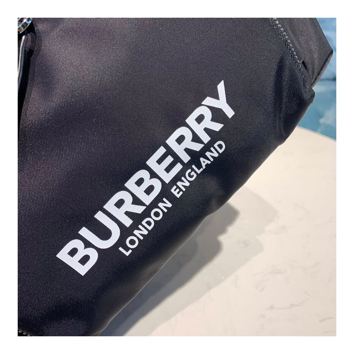 Burberry The Medium Rucksack in Logo Print Nylon 80116171