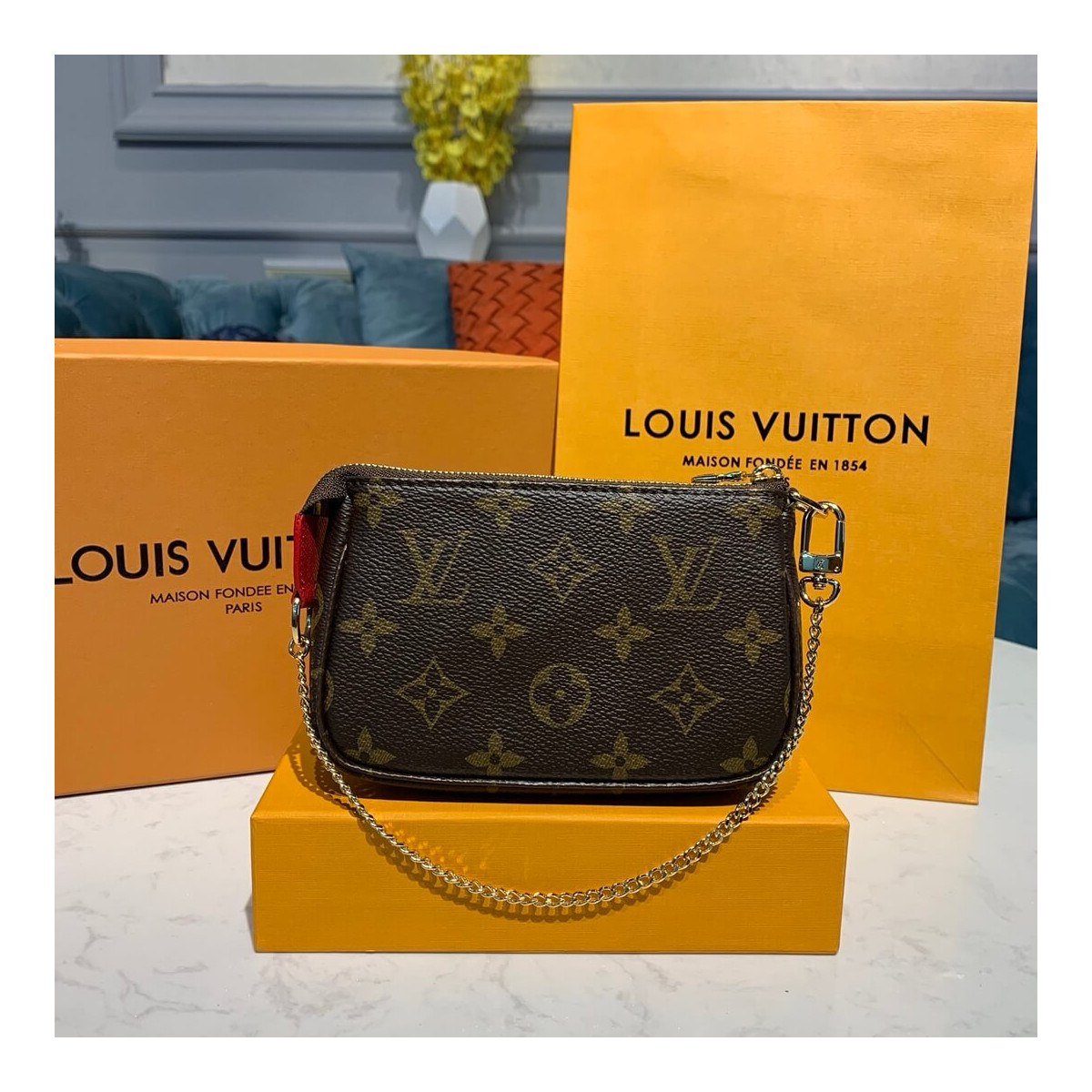 Louis Vuitton Courchevel Mini Pochette Accessoires M68490