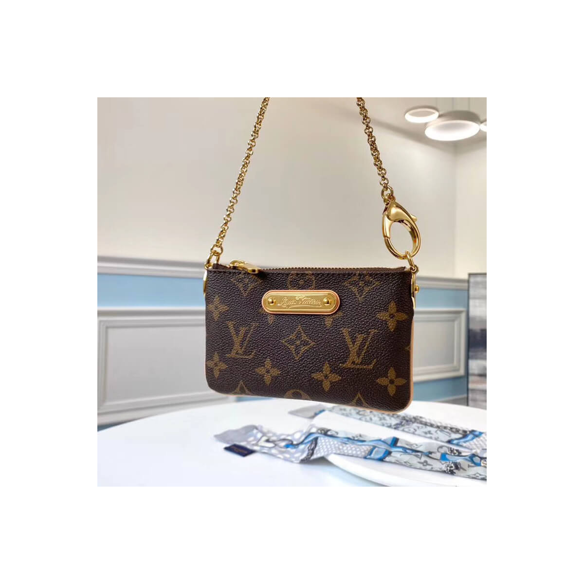 Louis Vuitton Monogram Pochette Milla PM M60095