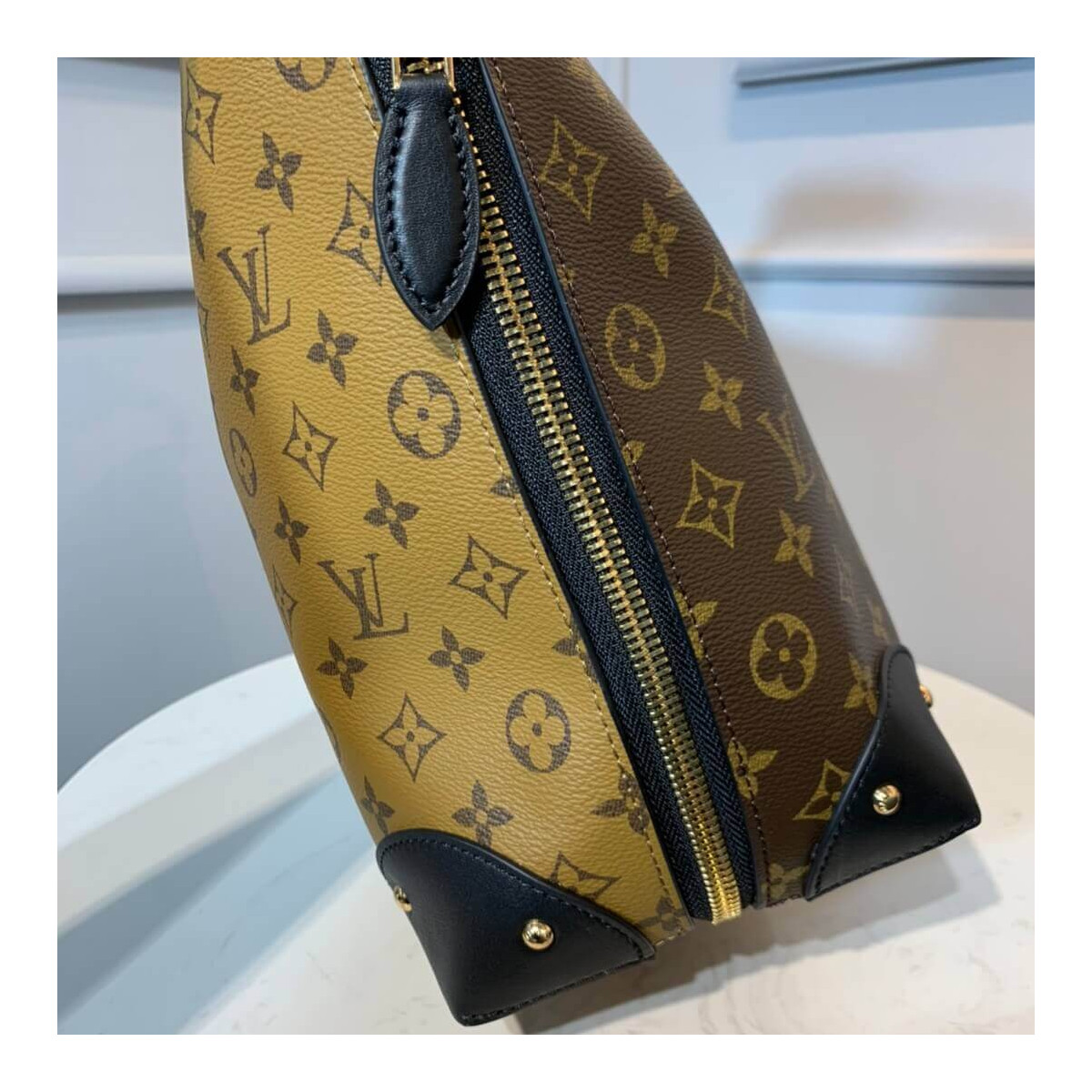 Louis Vuitton Monogram Canvas Triangle Softy M44130