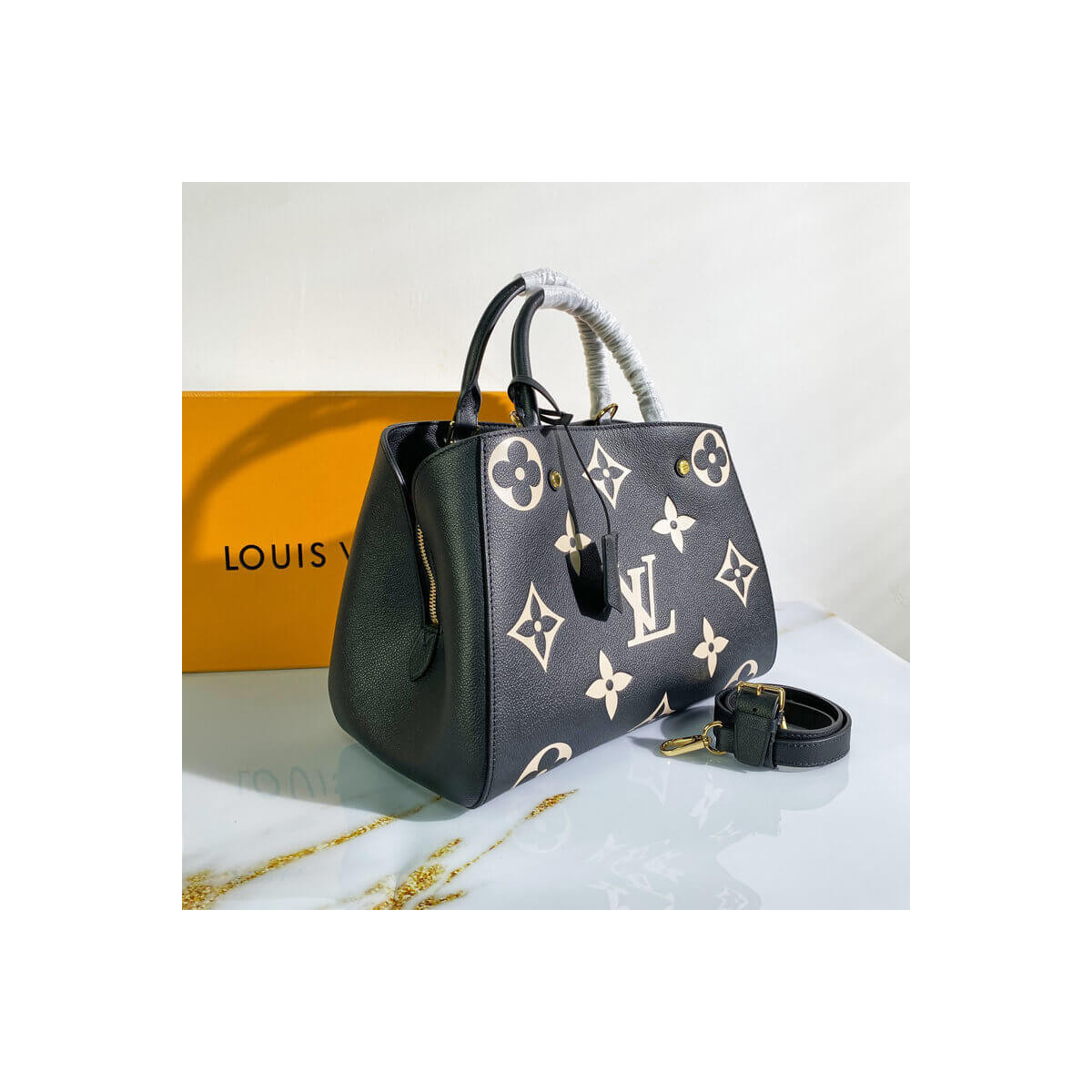 Louis Vuitton Monogram Empreinte Leather Montaigne MM M45499