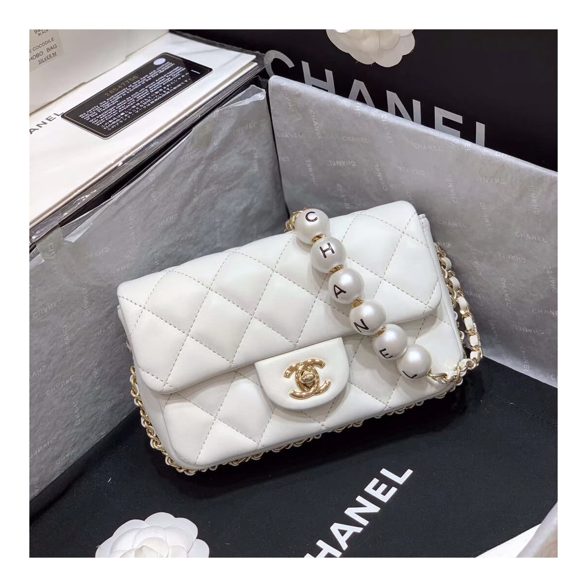 Chanel Small Pearl Logo Strap Flap Bag AS1436 White