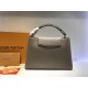 Louis Vuitton Taurillon Leather And Python Capucines MM N91711